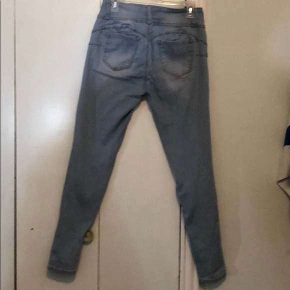 A pair of light washed skinny jeans - Picture 2 of 2